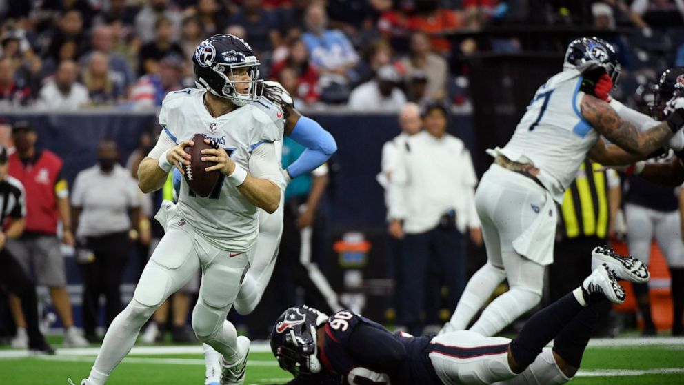 Titans clinch AFC’s top seed with 28-25 win over Texans 6